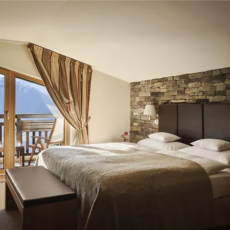 Отель Interalpen-hotel Tyrol Тельфс