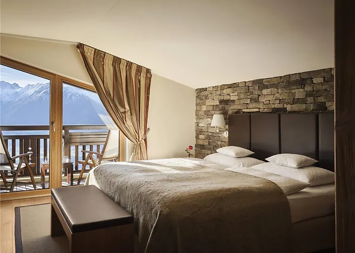 Отель Interalpen-hotel Tyrol Тельфс